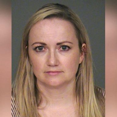 An Arizona mom was arrested after she said she accidentally left her baby locked in a hot car in a Target parking lot, according to authorities.