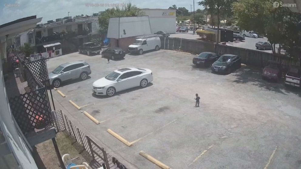 PHOTO: Surveillance video of the incident Wednesday shows the boy and his cousin walking far behind his mother, Gissel Vazquez, 18, in a Houston parking lot.