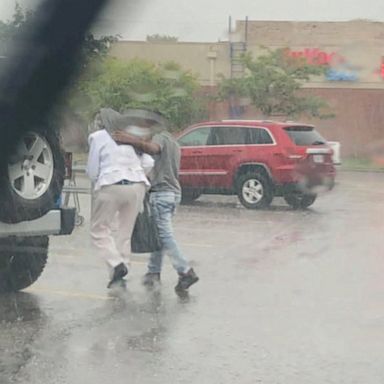 PHOTO: Police in Missouri are searching for a teenage boy who was seen by an officer performing an incredible act of kindness -- helping shield an elderly woman from the driving rain.