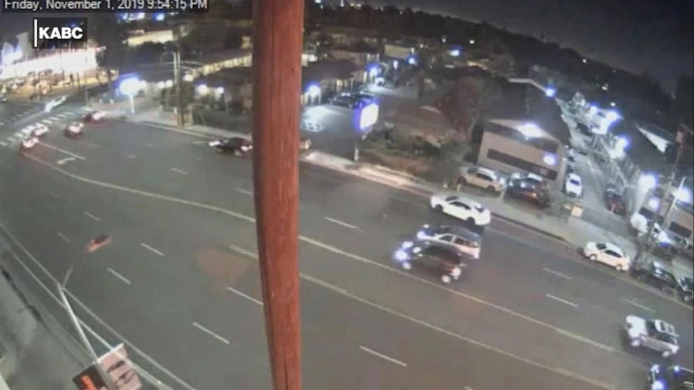 PHOTO: Surveillance video shows dozens of vehicles swerving around a hit-and-run victim (blurred circle, middle of frame) in Los Angeles.