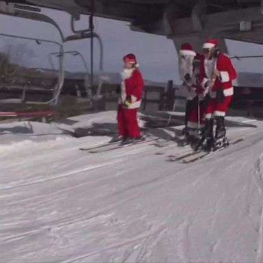 VIDEO: Dozens of Santas hit the slopes in Maine