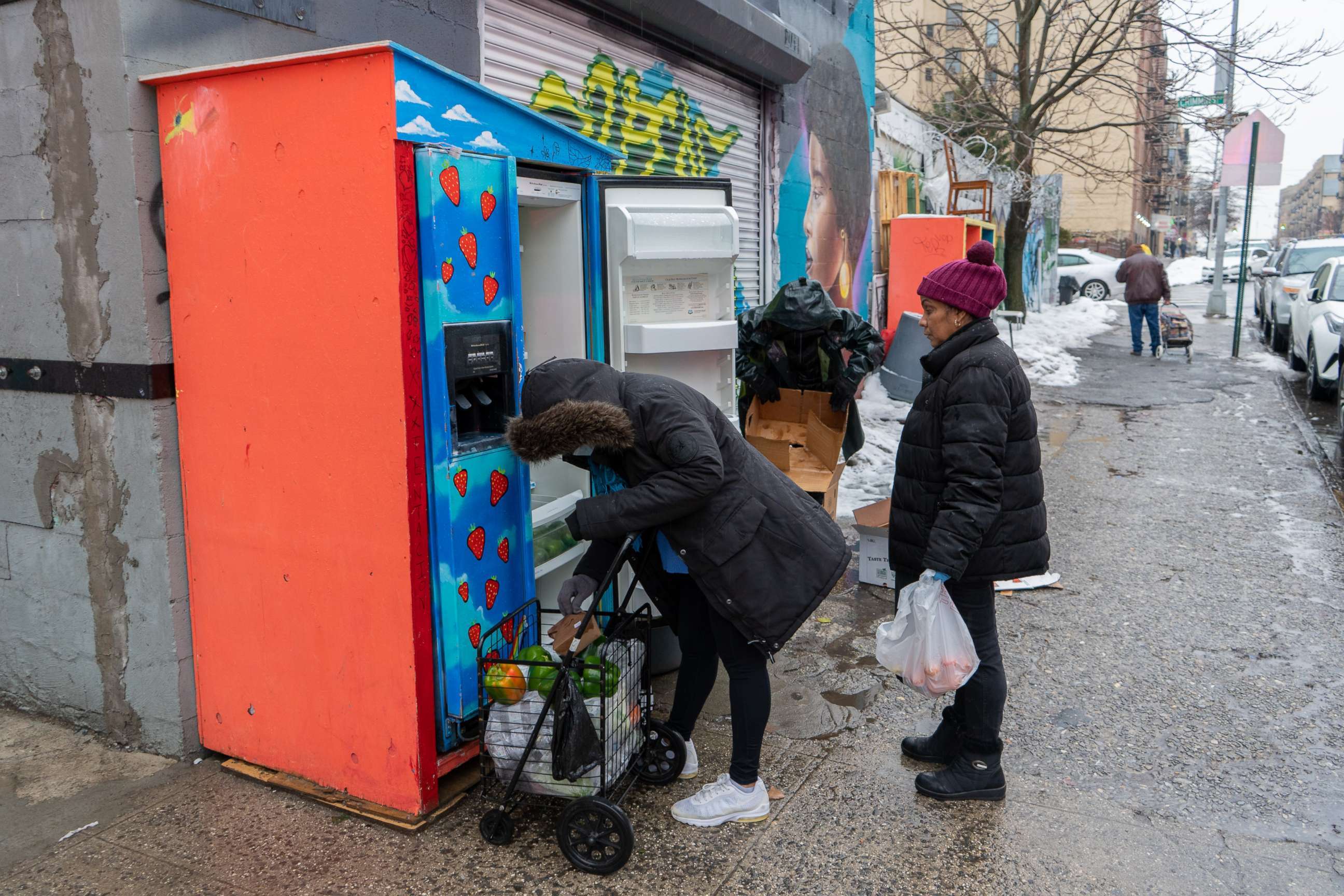 PHOTO: The Mott Haven community fridge on East 141st Street and St  Ann's Avenue in the Bronx, New York, visit the pantry.