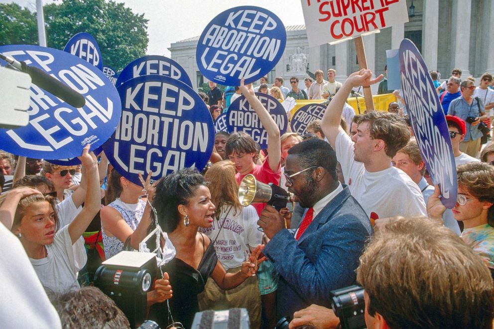 PHOTO: Pro-choice and anti-abortion demonstrators protest outside the U.S. Supreme Court on the day of the opening arguments in the Webster v Reproductive Health Services case, in Washington, D.C., April 26, 1989.