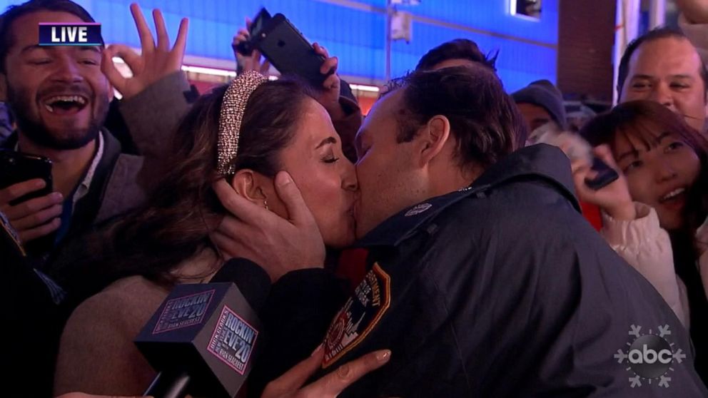 The couple shared a kiss after getting engaged in Times Square.