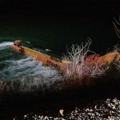 A cargo train derailed, sending the engine into an Idaho river late Wednesday night and leaving the driver and crew to be rescued by boat.