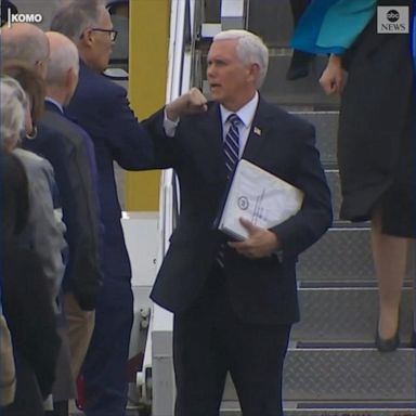 Vice President Mike Pence, who is leading the White House's coronavirus task force, bumped elbows with Washington Gov. Jay Inslee and other officials upon his arrival in Tacoma, Washington.