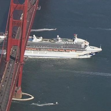 The Grand Princess cruise ship sails under the Golden Gate Bridge as it prepares to dock at the Port of Oakland on Monday.