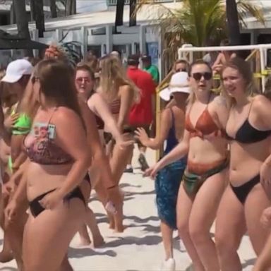 VIDEO: Young people warned to avoid crowds after being seen on Florida beaches