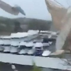 Roof blows off sports store in New Jersey