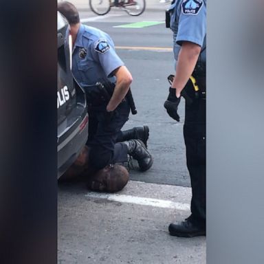 A video shows a man pleading for his life as an officer restrains him with a knee on his neck after responding to a “forgery in progress,” according to a police statement.