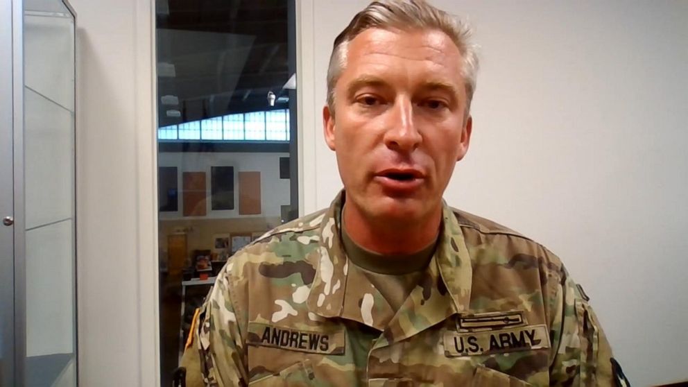 PHOTO: Lt. Col. Sam Andrews, of the Minnesota National Guard, speaks to ABC News' Linsey Davis about removing law enforcement from a protest in St. Paul, Minnesota. 