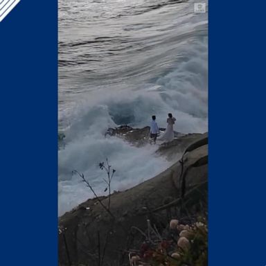 VIDEO: Couple swept into ocean while taking wedding photos