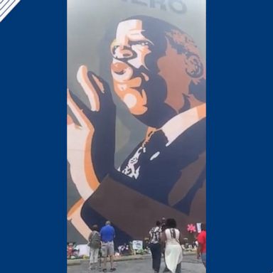 A 65-foot-tall mural in downtown Atlanta honors the lifelong activist.