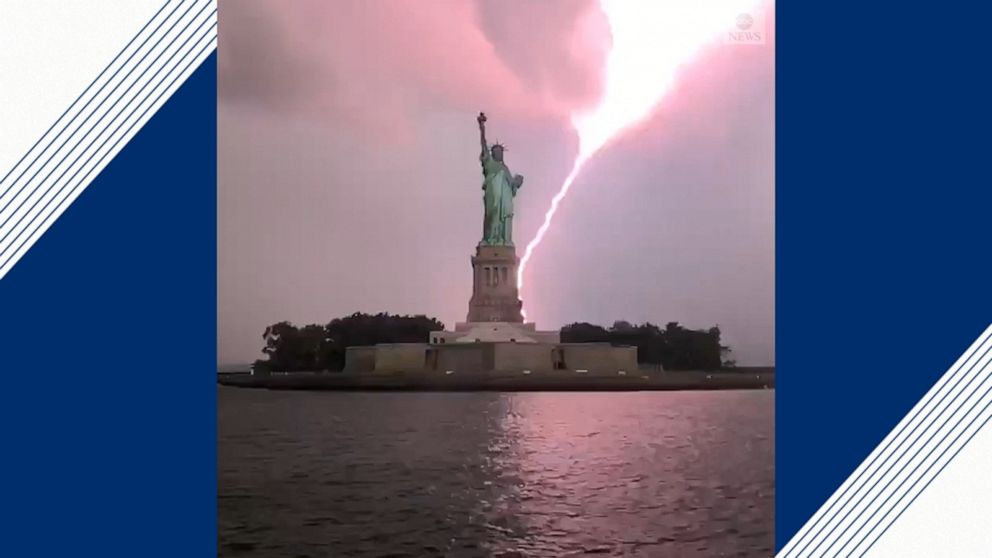 Statue of Liberty lit up by lightning Video ABC News