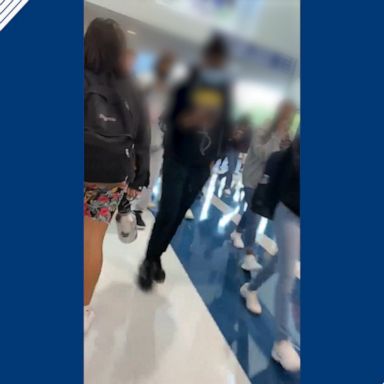 Students are seen crowding a hallway as classes are dismissed at North Paulding High School in Dallas, Georgia, on Aug. 4, 2020.