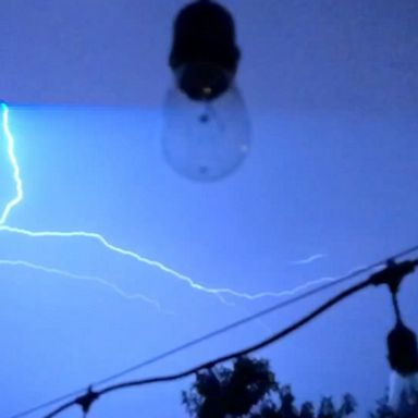 A Houston resident filmed lightning bolts spreading across the sky as thunderstorms hit the area.