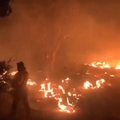 VIDEO: Firefighters save American flag from property destroyed by Lake Fire