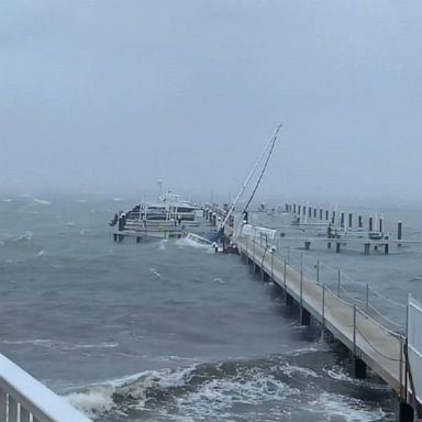 Boats were slammed into the pier as Pensacola, Florida, was pelted with high wind and rain.