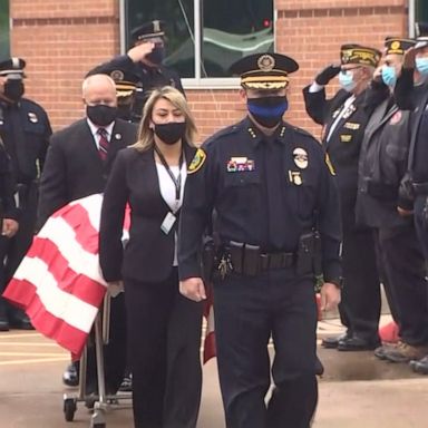 Hundreds of officers saluted Ernest Leal Jr., 60, who died after a weekslong battle with coronavirus.