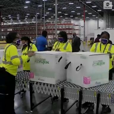 Boxes containing Moderna’s COVID-19 vaccine rolled out from a Mississippi facility to the FedEx hub for nationwide distribution.