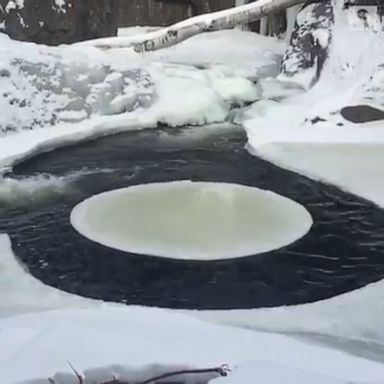 A hiker spotted an ice circle spinning on top of the Smalls Falls waterfall after heavy snowfall in the area.