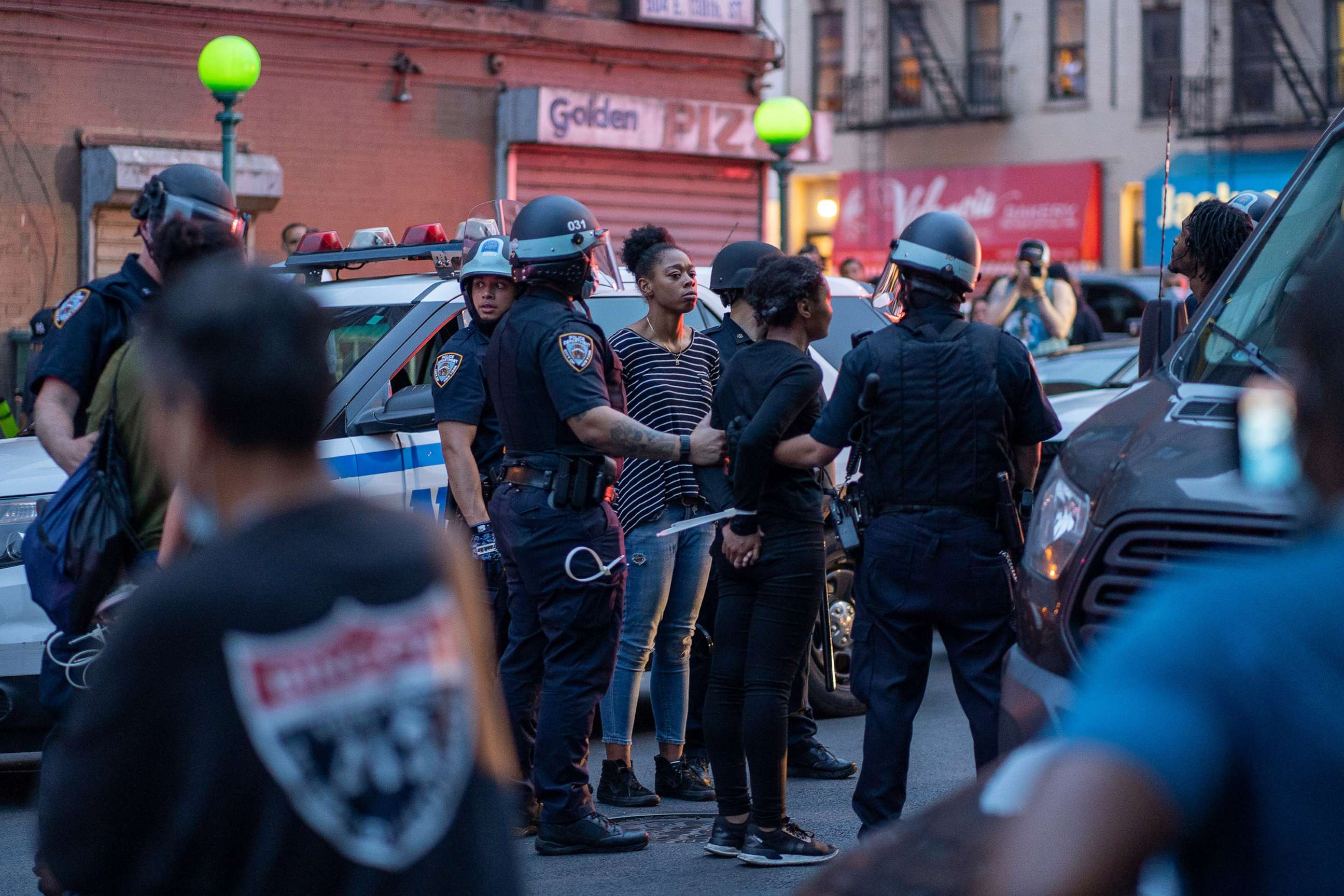 PHOTO: NYPD arrest protesters for breaking the citywide 8:00PM curfew on June 4, 2020 in the Bronx borough of New York City.