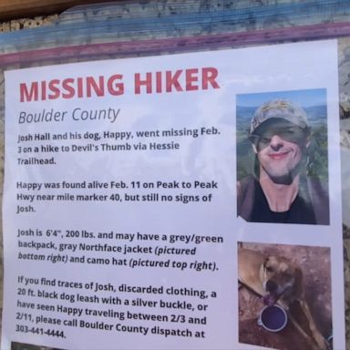 Josh Hall, 27, and his dog, Happy, went hiking on the Hessie Trailhead last Wednesday.