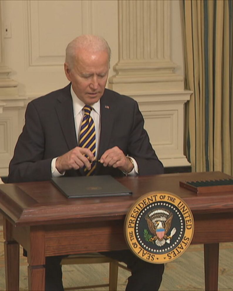 Biden signs executive order aimed at securing critical US supply