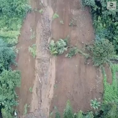 A community in Kauai, Hawaii, was isolated after heavy rain caused massive landslides across a highway connecting it to the rest of the island.