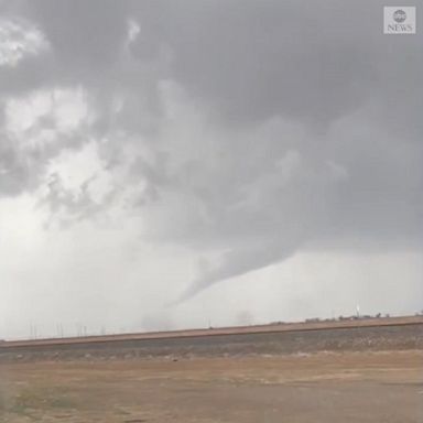 A tornado was spotted forming near Lubbock, Texas, as a major storm targets parts of the central U.S. 