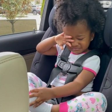 A viral video shows a 2-year-old girl waving a tearful goodbye to her grandfather in Greenville, North Carolina.