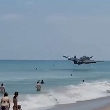 A World War II-era plane participating in the Cocoa Beach Air Show safely made an emergency landing on a busy beach.