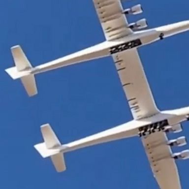 The six-engine Stratolaunch jet, with a 385-foot wingspan, takes to the skies over the Mojave Desert in its second test flight.