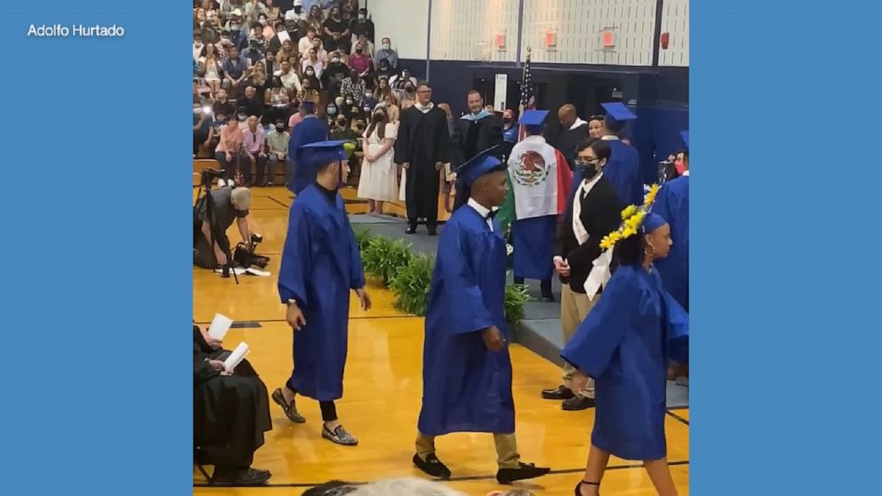Student denied diploma for wearing Mexican flag over gown Student denied diploma for wearing Mexican flag over gown