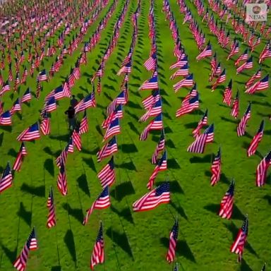 The flags have been arranged to honor the victims and first responders of 9/11.