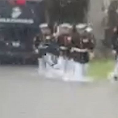 A group of Marines helped push a stranded vehicle out of floodwaters near the Pentagon last week in Arlington, Virginia.