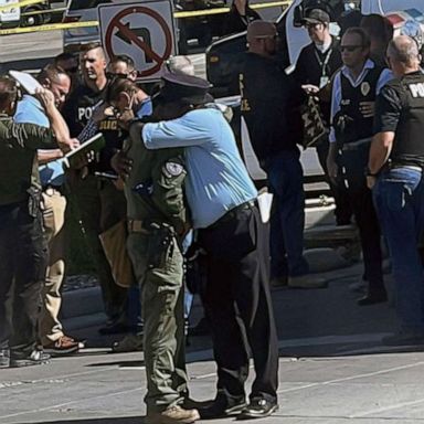 A shooting broke out on a stopped Amtrak train in Tuscon, Arizona. The suspected gunman is dead, police said.