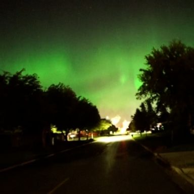 The green shimmering lights of the aurora borealis lit up the night sky over North Dakota.