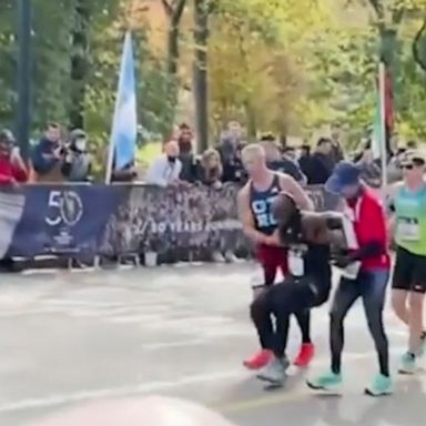 A powerful moment was captured near the finish line of the New York City Marathon as participants helped a fellow runner complete the race.