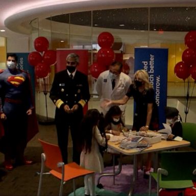 First lady Jill Biden visited Texas Children's Hospital in Houston and teamed up with DC Comics and WarnerMedia to encourage parents to get children ages 5 to 11 vaccinated.