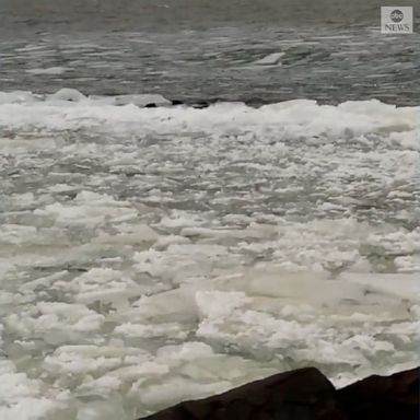 Chunks of ice crashed against the shoreline of Lake Superior amid bitter cold temperatures in the region.