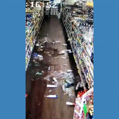 Security camera footage shows bottles fall off a liquor store’s shelves as a strong earthquake struck the Northern California coast.