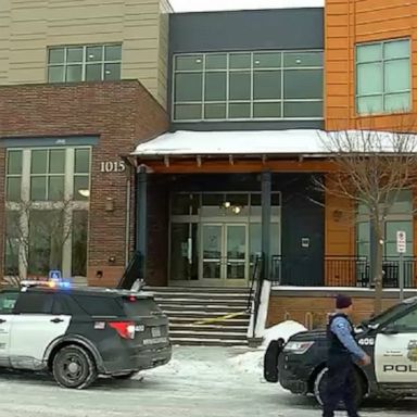 The gunman opened fire at a post-funeral meal at a Minneapolis community center where about 100 people were gathered, authorities said.