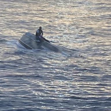 The Coast Guard was combing the waters off eastern Florida Tuesday afternoon, looking for 39 people on a boat that capsized.