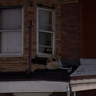 The suspect, who was found "covered with blood," has surrendered, police said.