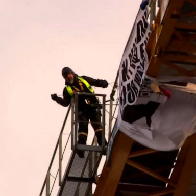 Manuel Oliver climbed a crane in Washington on Monday, four years after 17 people were gunned down at Stoneman Douglas High School in Parkland, Florida, to demand action on gun violence.