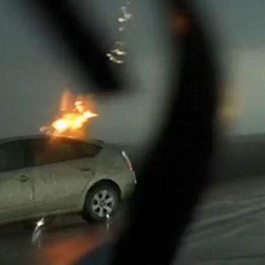 A storm chaser captured the moment a car was struck by lightning in Iowa and said the person in the car “was fine,” but the vehicle was “demobilized.” 