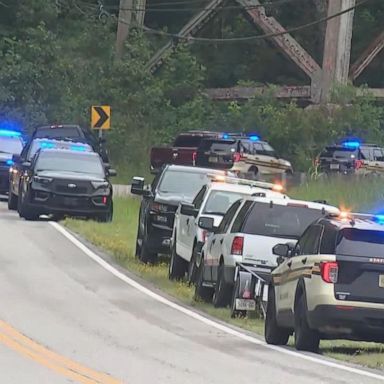 A Marion County deputy and a Tennessee Highway Patrol trooper were killed Tuesday when their helicopter hit a power line and crashed in a wooded area, authorities said.