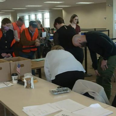 VIDEO: In Pennsylvania, election officials begin long process of counting mail-in ballots