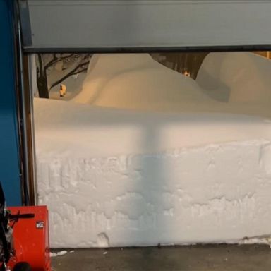 VIDEO: New York resident finds huge snowdrift when he opens garage door